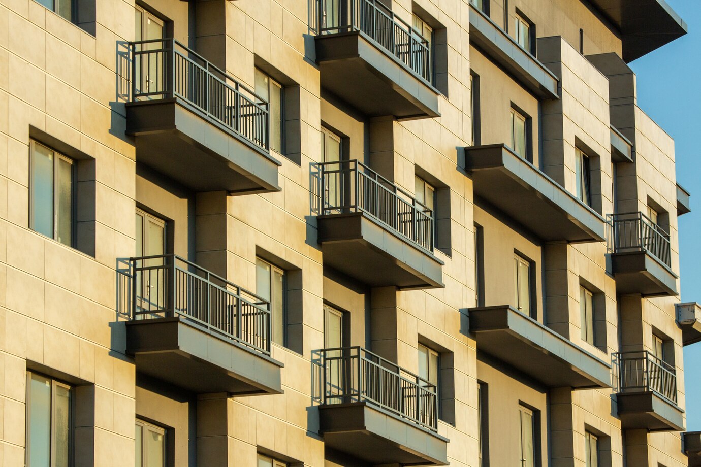 residential-building-with-windows-balconies_140725-7608